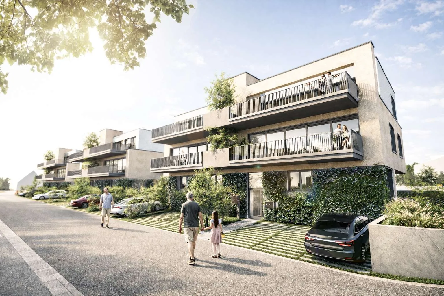 Straßenansicht: die drei Mehrfamilienhäuser des Bienwald Quartiers